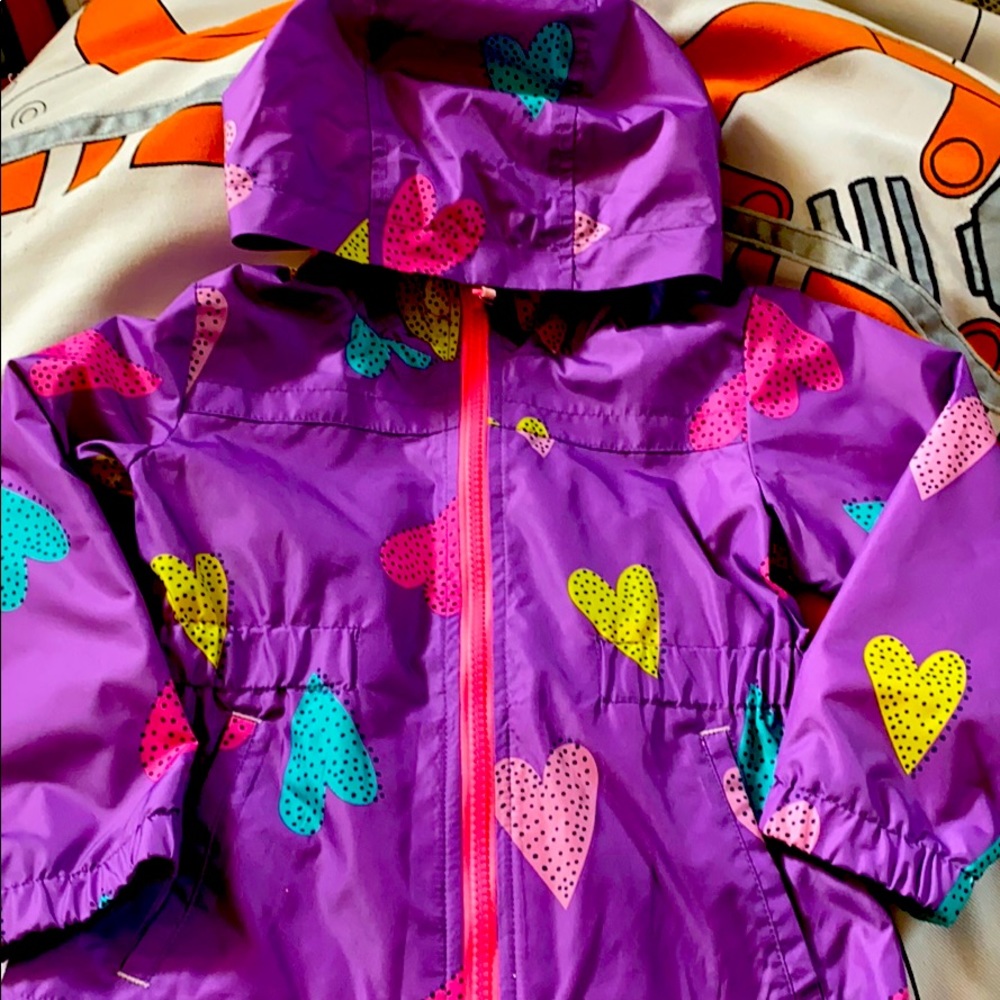 New rain jacket w/tag. Size 4T